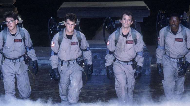 Harold Ramis, Dan Aykroyd, Bill Murray, and Ernie Hudson walking