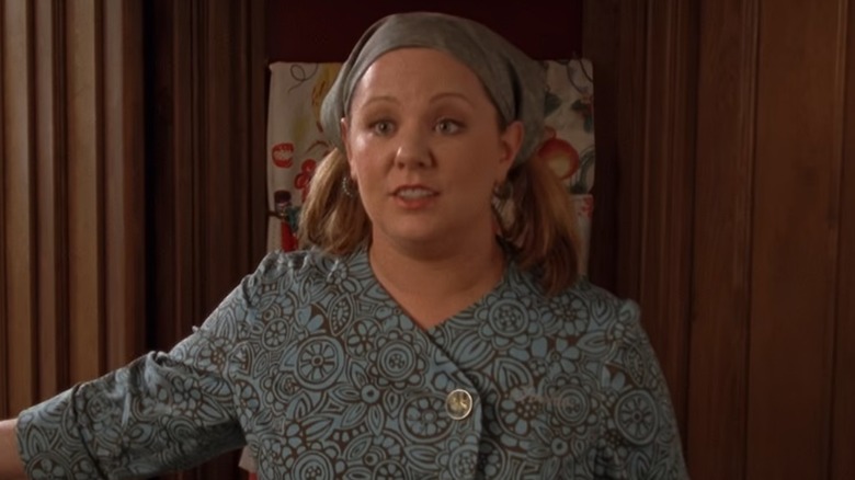 Sookie gesturing in kitchen