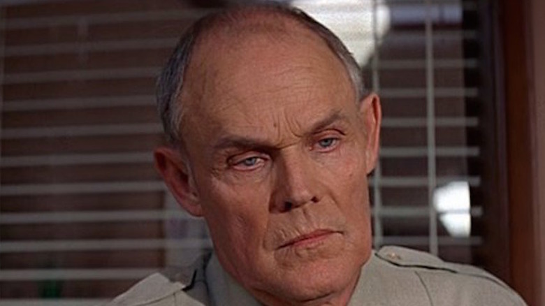 Lewis Arquette gives a serious look