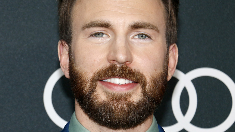 Chris Evans attends event 