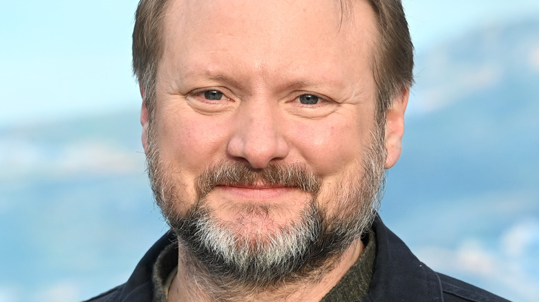 Rian Johnson smiling at event