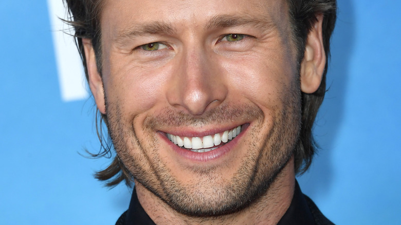 Glen Powell smiling