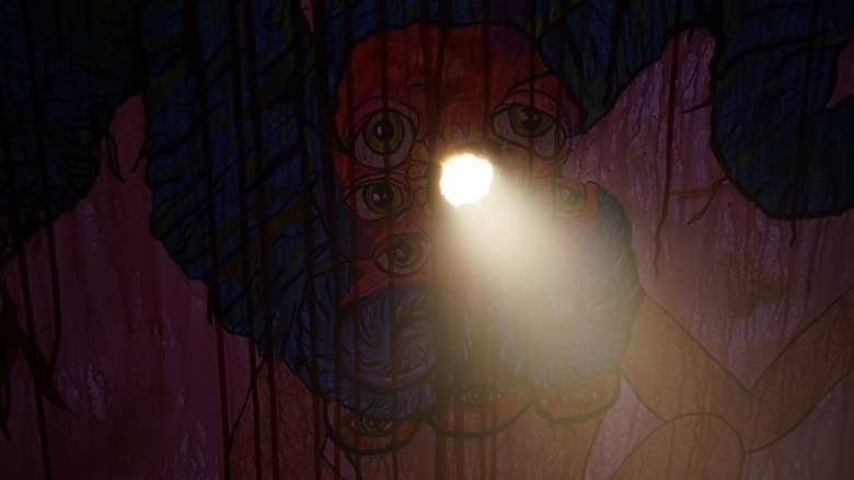 The God peering through a hole