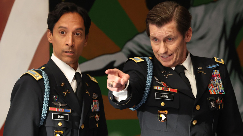 Patrick pointing while Abraham looks surprised