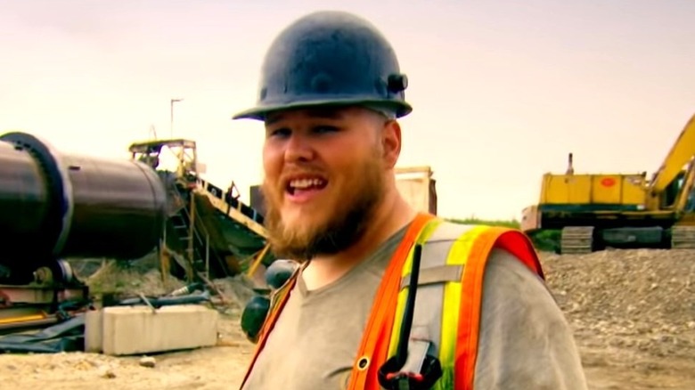 Mike Beets orange vest at mining site