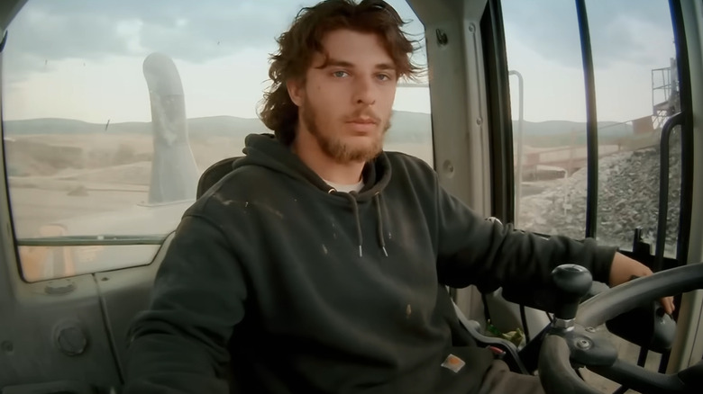 Jacob McClure operating machinery