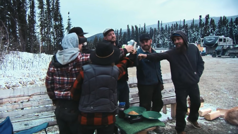 Parker's crew celebrating a gold rush haul