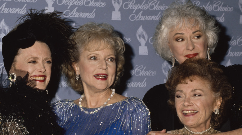 The cast poses for a photo