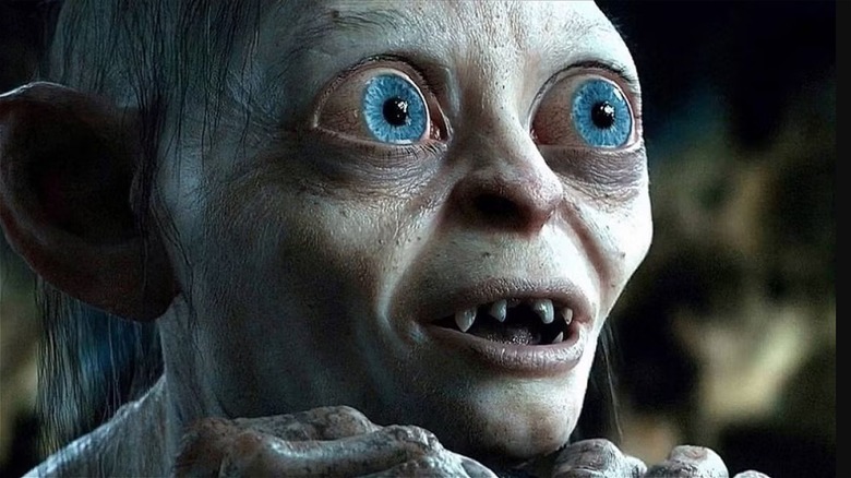 Gollum looking up with big blue eyes
