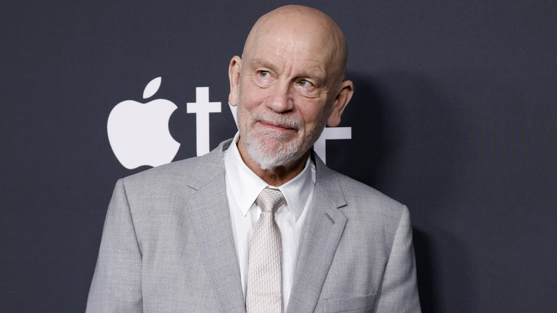 John Malkovich smiling at Apple TV+'s 