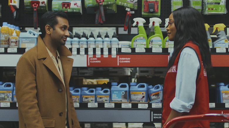 Arj talking to Elena in a store aisle