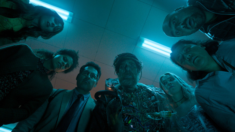 View from below of the team looking down in "Good Luck, Have Fun, Don't Die" (2026)