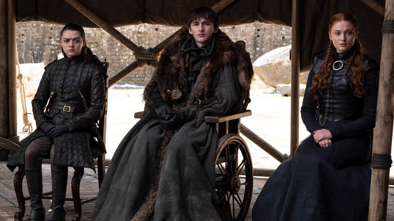 Game of Thrones' Arya, Bran, and Sansa look on
