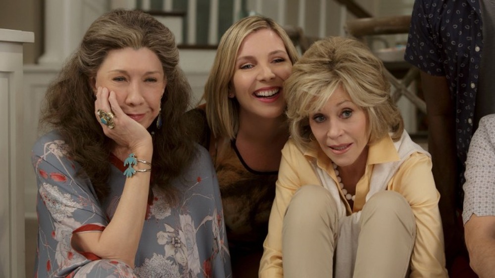 Grace, Frankie and Brianna sitting in living room