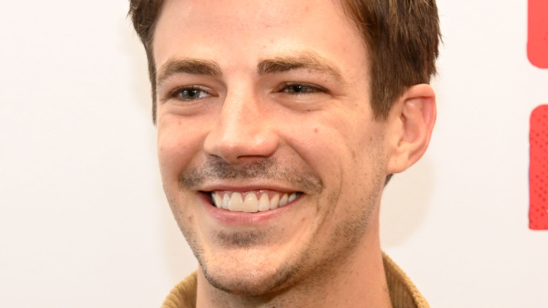 Grant Gustin looking happy