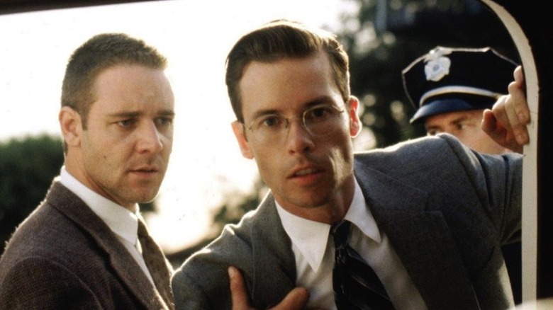 Bud White holding back Edmund Exley car