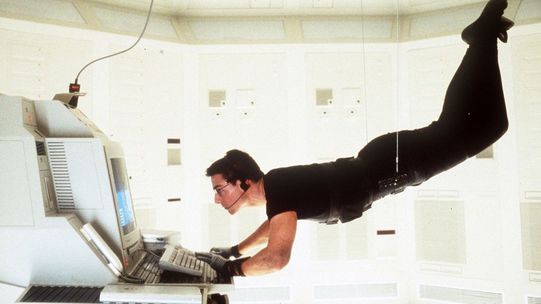 Tom Cruise Ethan Hunt hanging from ceiling