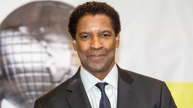 Denzel Washington tight lipped smile