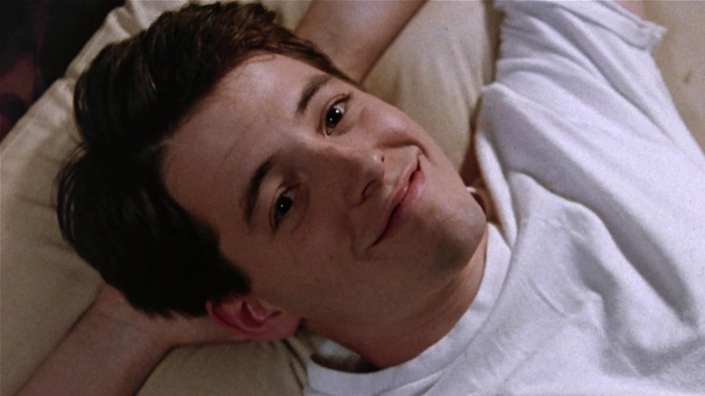 Ferris Bueller smiling slyly