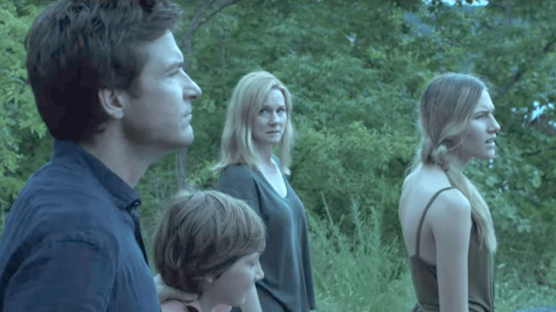 Byrde family looking into distance