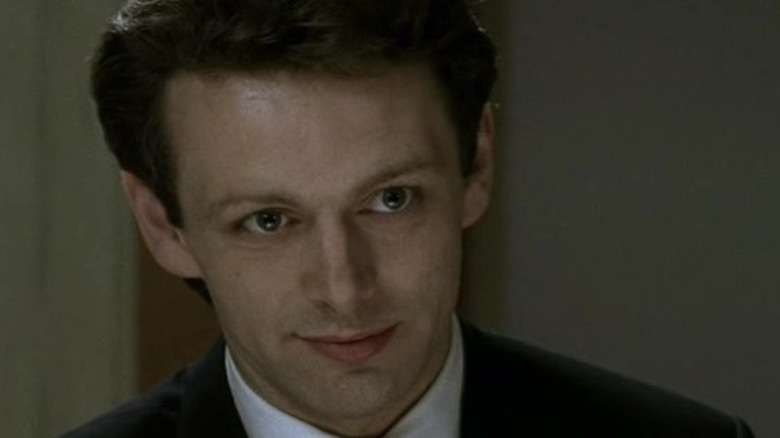 Michael Sheen smiles