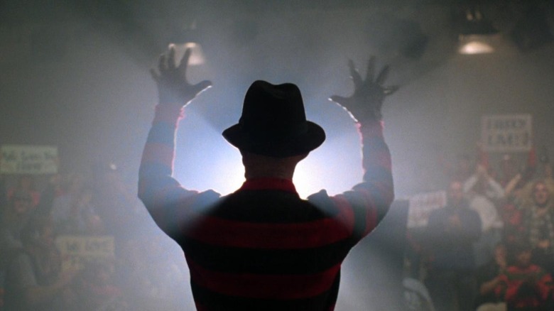 Freddy Krueger making claw hands