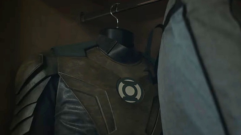 A Green Lantern suit hanging in a closet in Lanterns (2026)