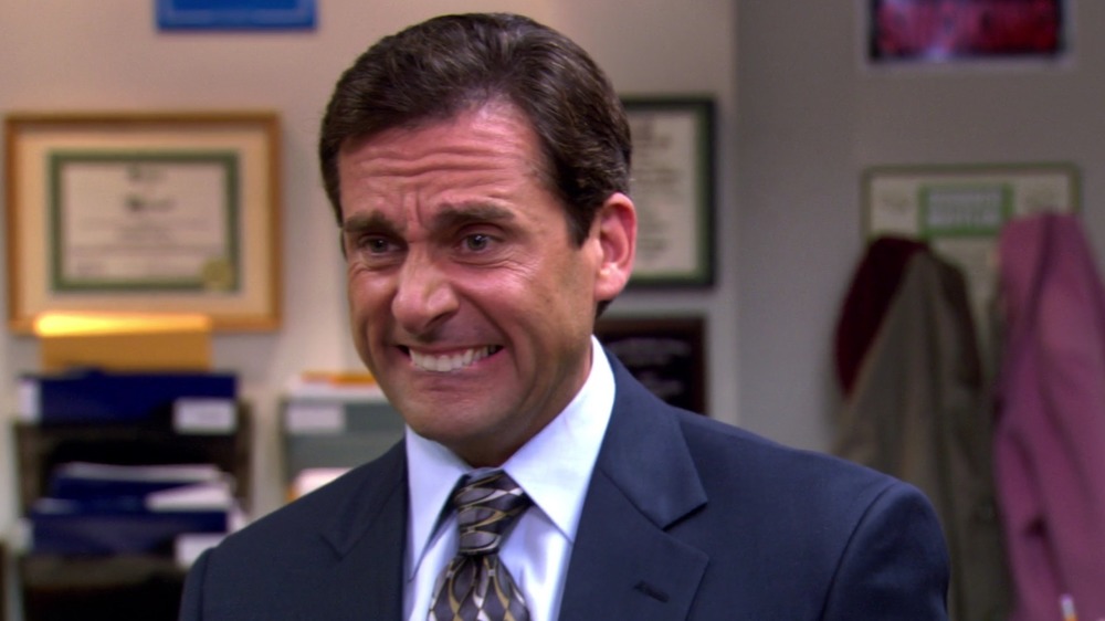 Michael Scott cringing