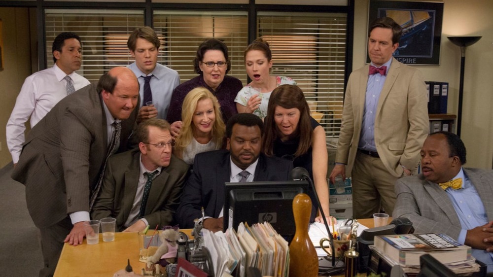 The Office cast gathers around a computer