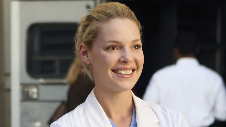 Izzie hair back smiling