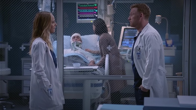 Dr. Altman looks at Dr. Hunt
