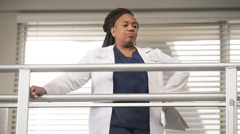 Bailey looking down at new interns