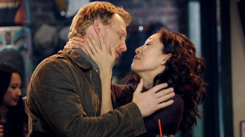 Owen and Cristina embracing