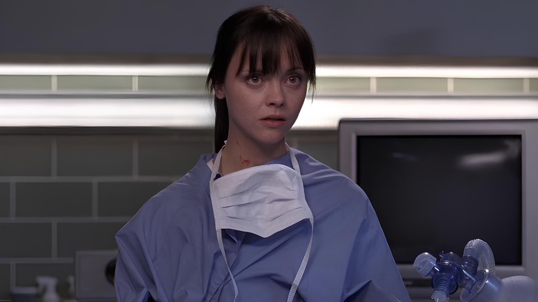 Hannah Davies wearing surgical scrubs