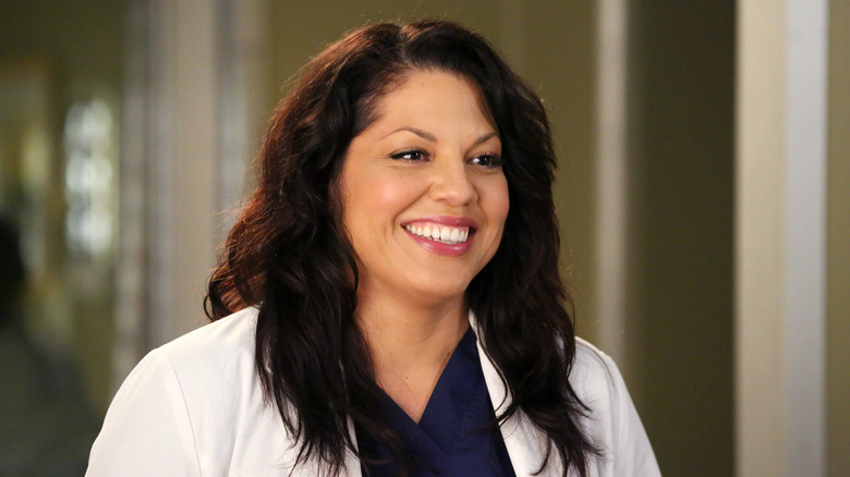 Callie Torres smiling lab coat