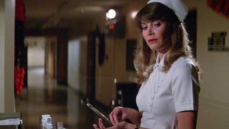 Nurse Bailey stands in the hospital hallway in "Halloween II" (1981)