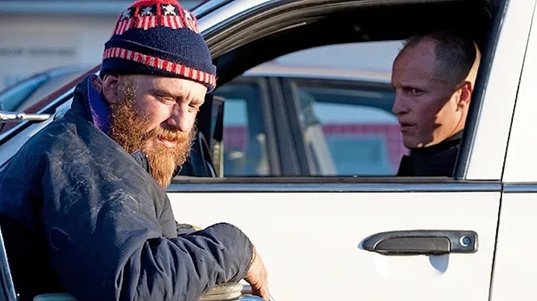 Terry sits outside David's car in "Rampart" (2011)