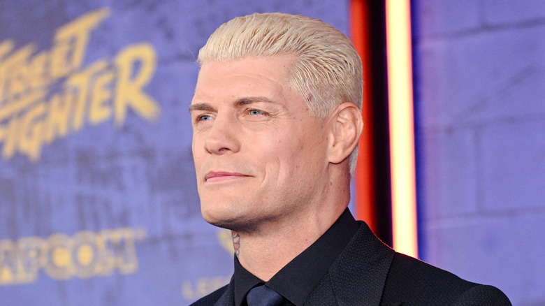 Cody Rhodes wearing a black suit