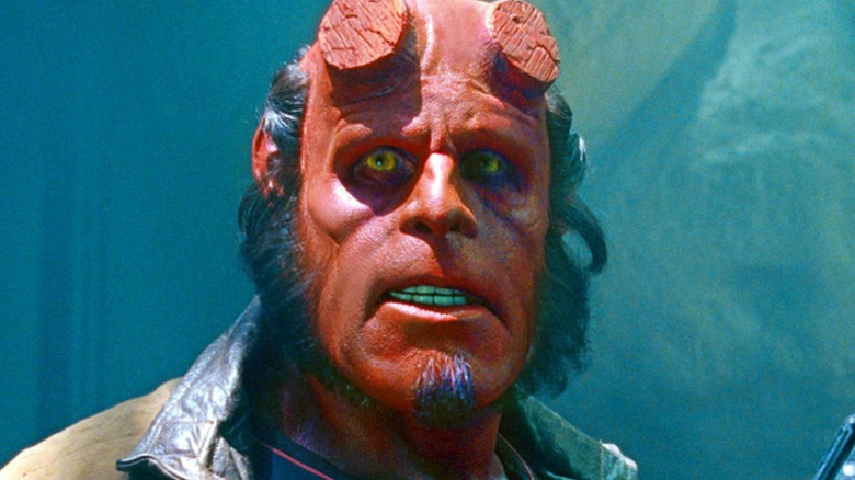 Hellboy looking ahead at something in 