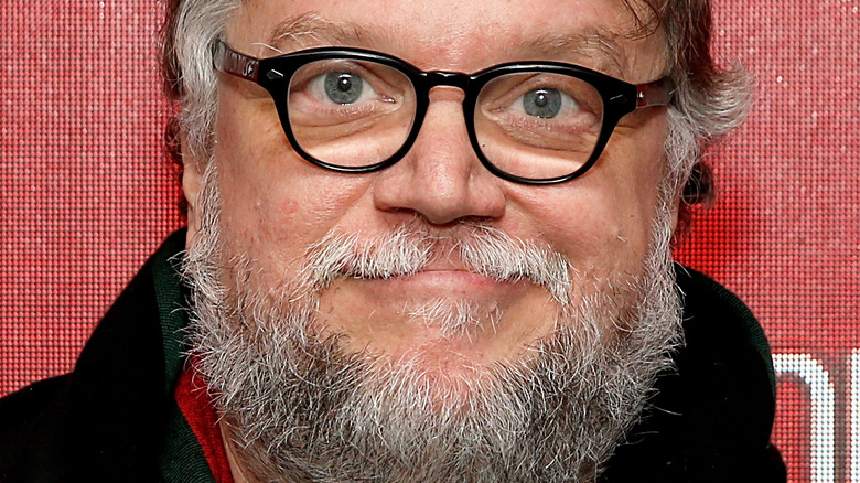 Guillermo del Toro wearing black framed glasses