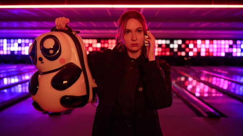 Karen Gillan holds bag