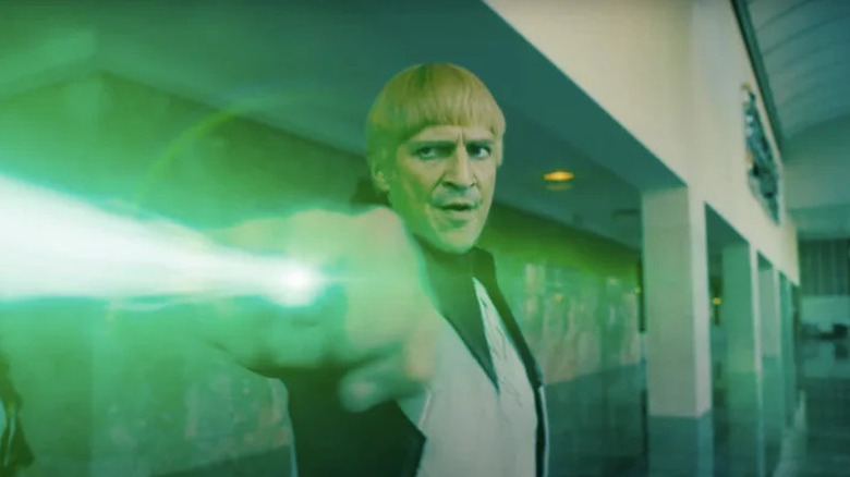 Guy Gardner firing an energy beam from his power ring in Superman