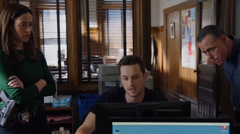 Cops looking at computer