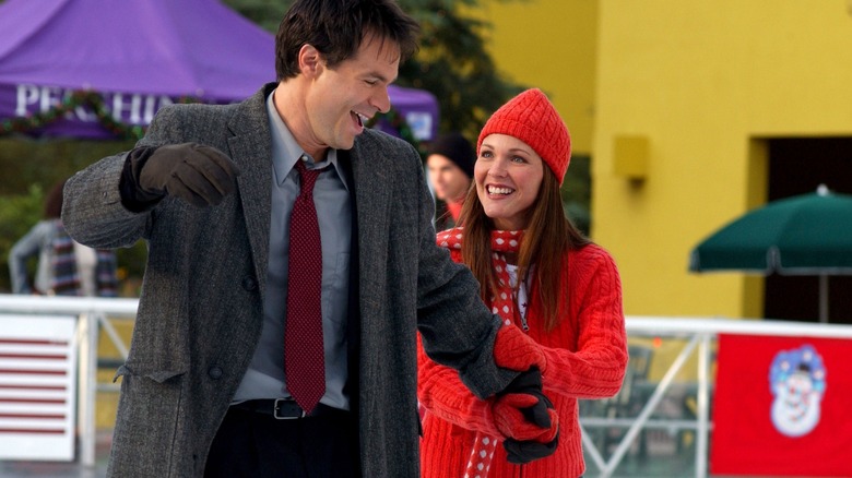 The two leads of A Boyfriend for Christmas ice skating together (2004)