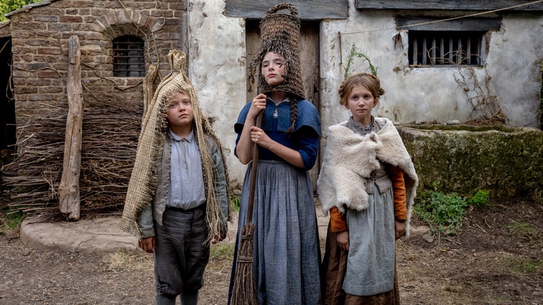 Hamnet in costume with Susanna and Judith in Hamnet