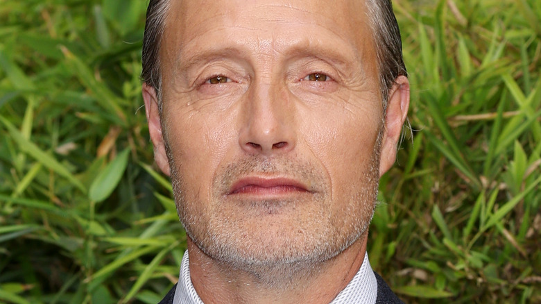 Mads Mikkelsen staring intensely