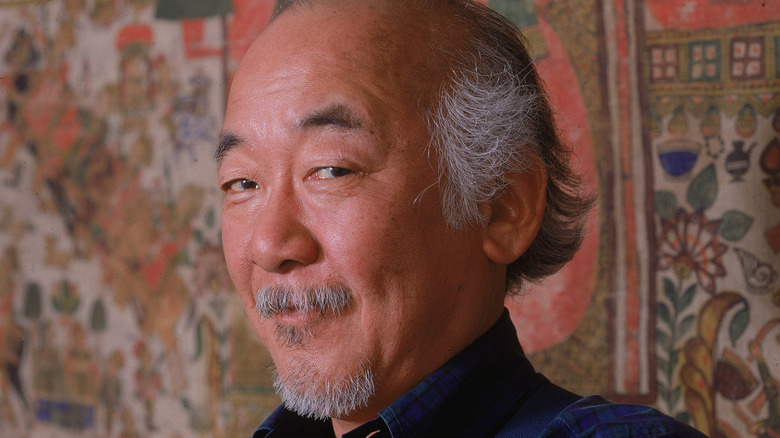 Pat Morita with tapestry