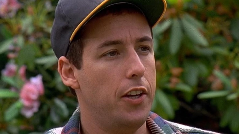 Adam Sandler in black cap