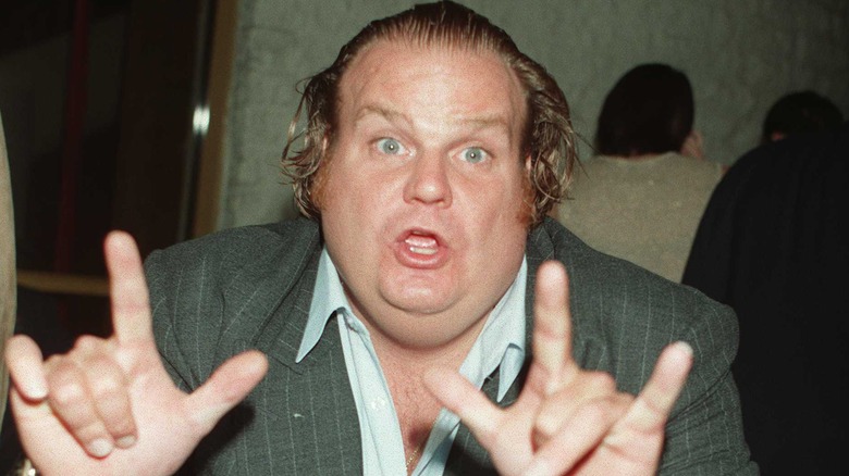 Chris Farley doing a pose