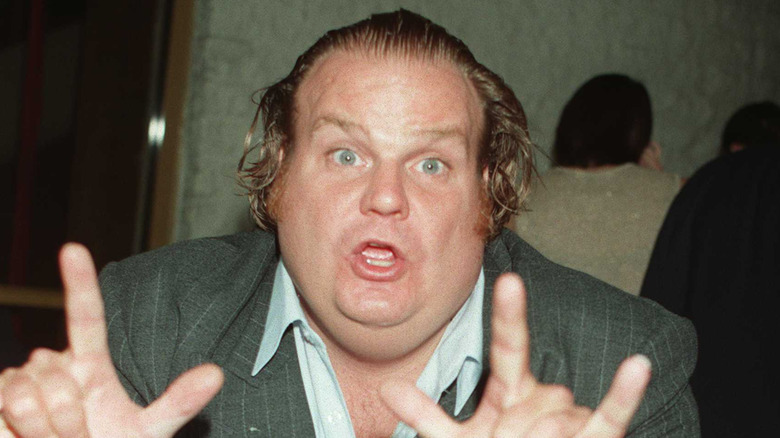 Chris Farley doing a pose